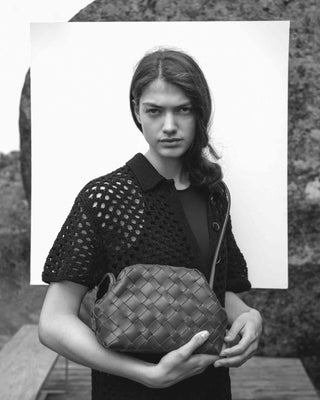 Cala Jade black and white image aimee clutch on model