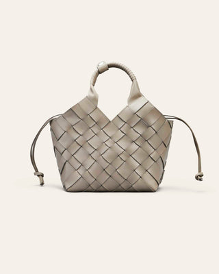 Cala Jade Grey Woven leather handbag on a beige background