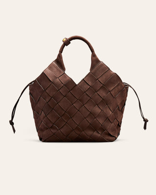 A brown woven nubuck leather shoulder bag on a beige background
