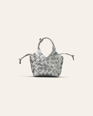 Silver leather Woven handbag on a light gray background