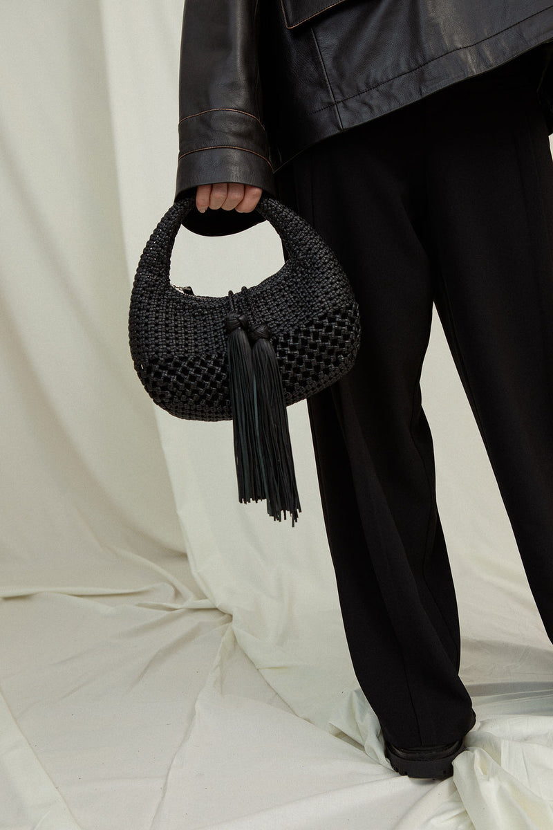 KEDI Mini Bag - hand-braided baguette bag on model