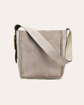 Gray leather tote bag bag with a strap on a light beige background