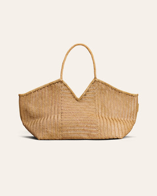A large natural woven leather tote bag with a single top handle, displayed against a solid off-white background.
