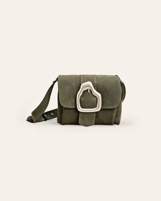 Green suede handbag with a silver clasp on a white background