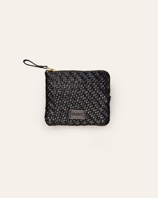 Cala Jade small black leather pouch on a beige background