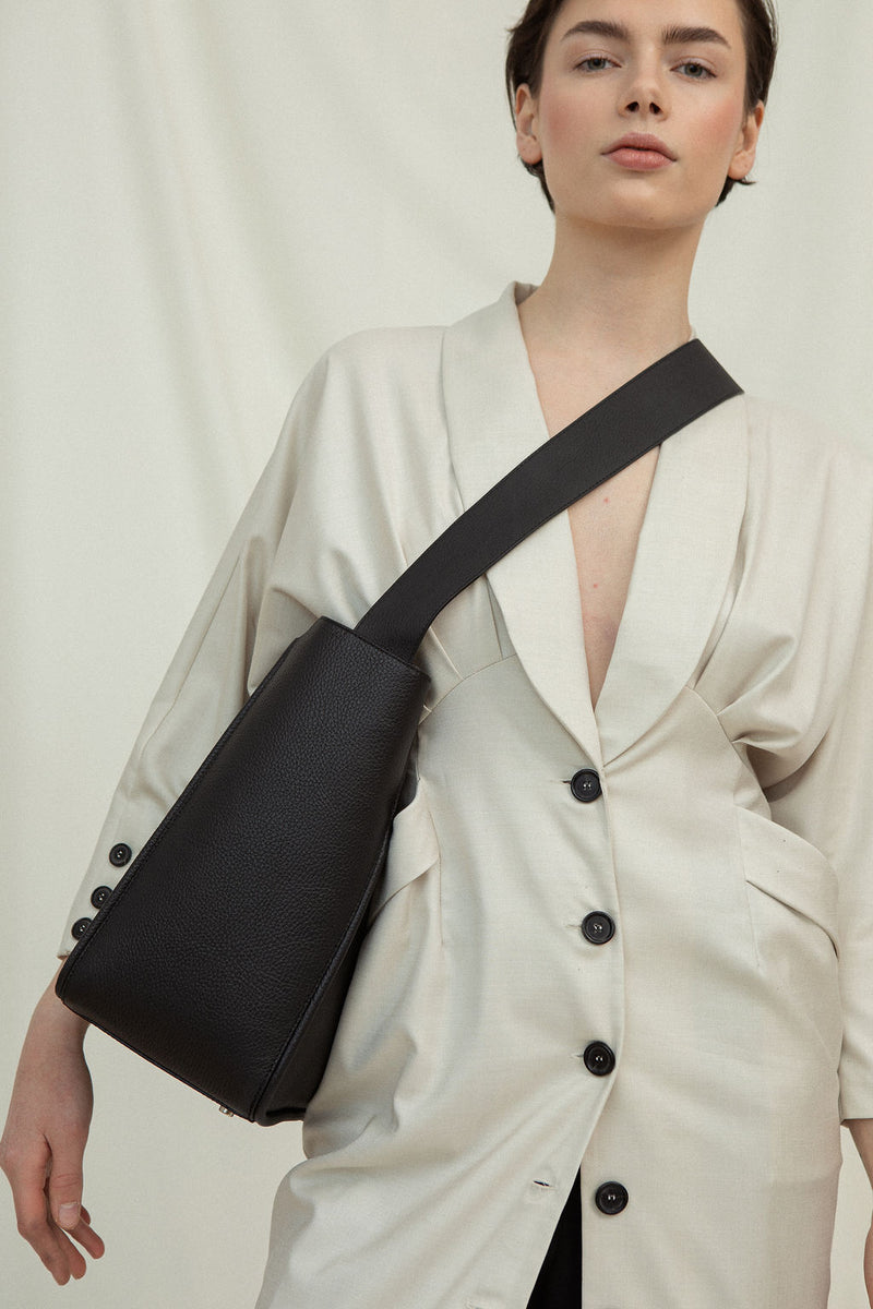 Cala Jade Masago black leather tote bag on model