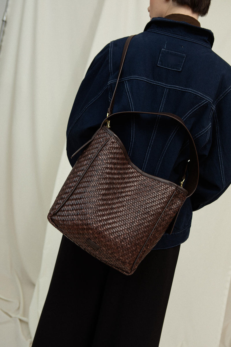 Cala Jade IWA pecan leather bag on model